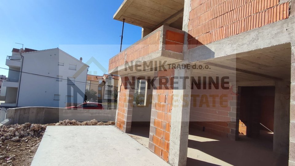 Vodice, new building, two-room apartment with a yard and a large terrace